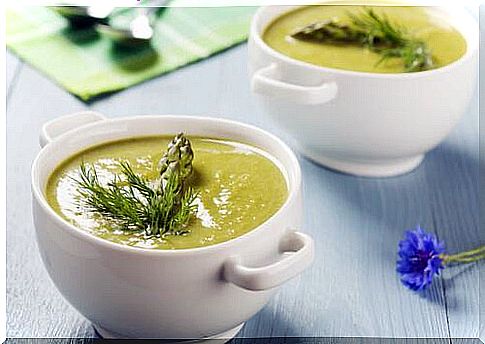 Two bowls of asparagus soup