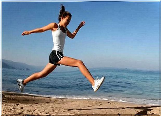 Woman sports on the beach