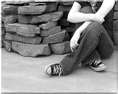 Woman sitting on the floor