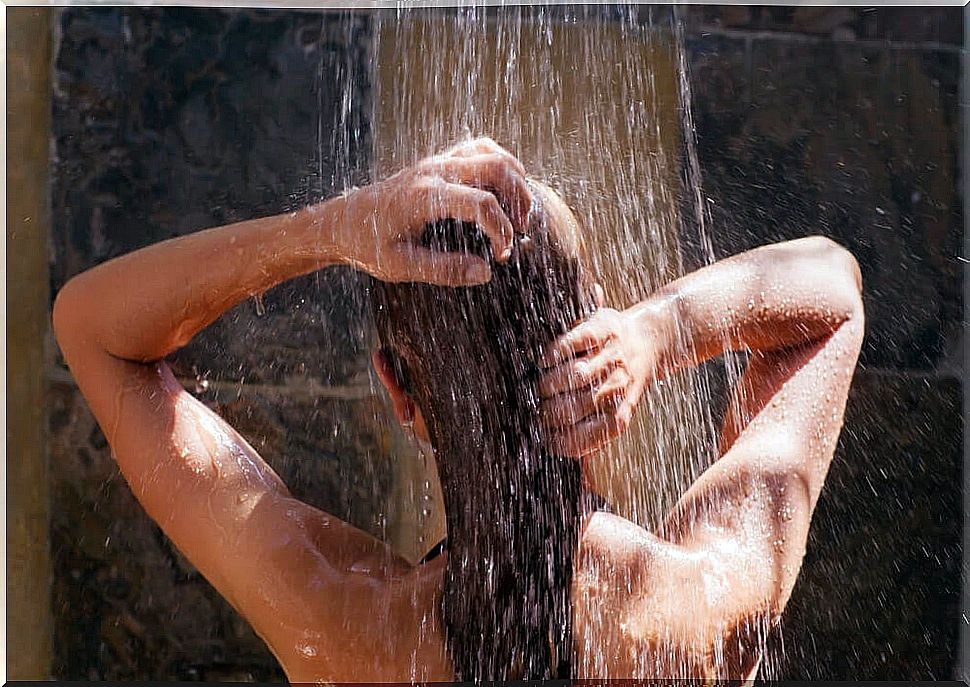 woman is taking a shower