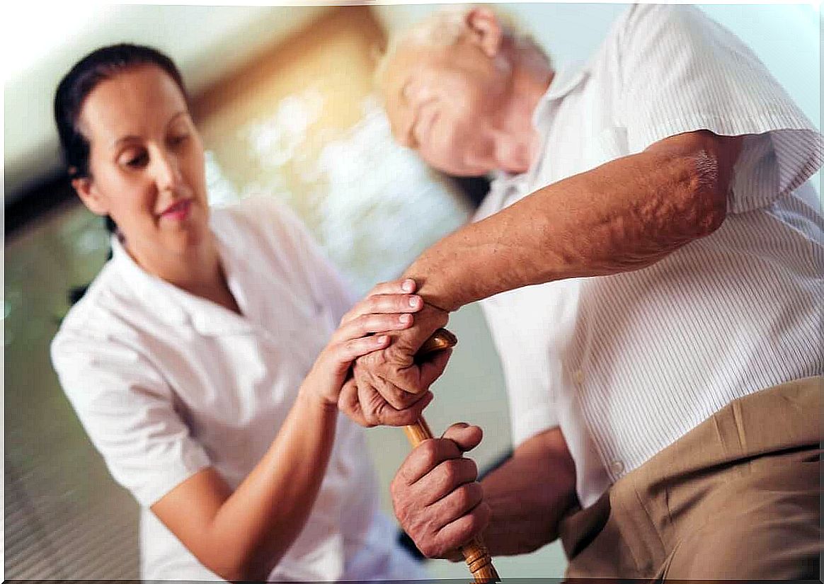 Elderly man with a nurse