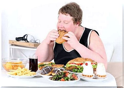 Woman compulsively eats fast food