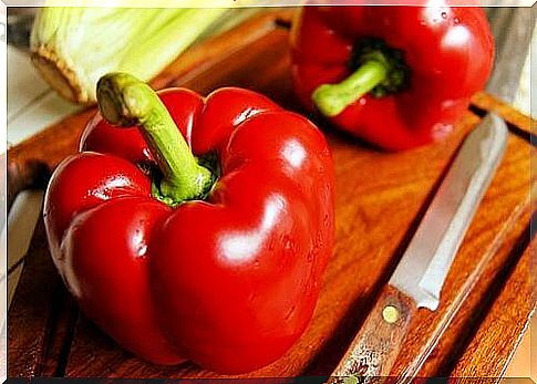 Red peppers on a cutting board